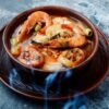 Gamberoni cotti in padella con pomodoro leggermente piccante